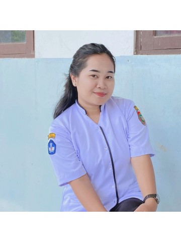 Theresia, S.Pd